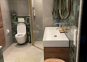 De kracht van details: Zo maak je van je badkamer een geheel